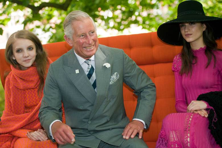 Charles touts wool’s superior qualities – by burying a jumper