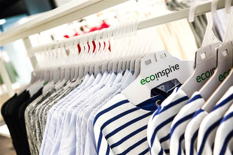 Sustainable hanger features recycled chipboard and reusable hook