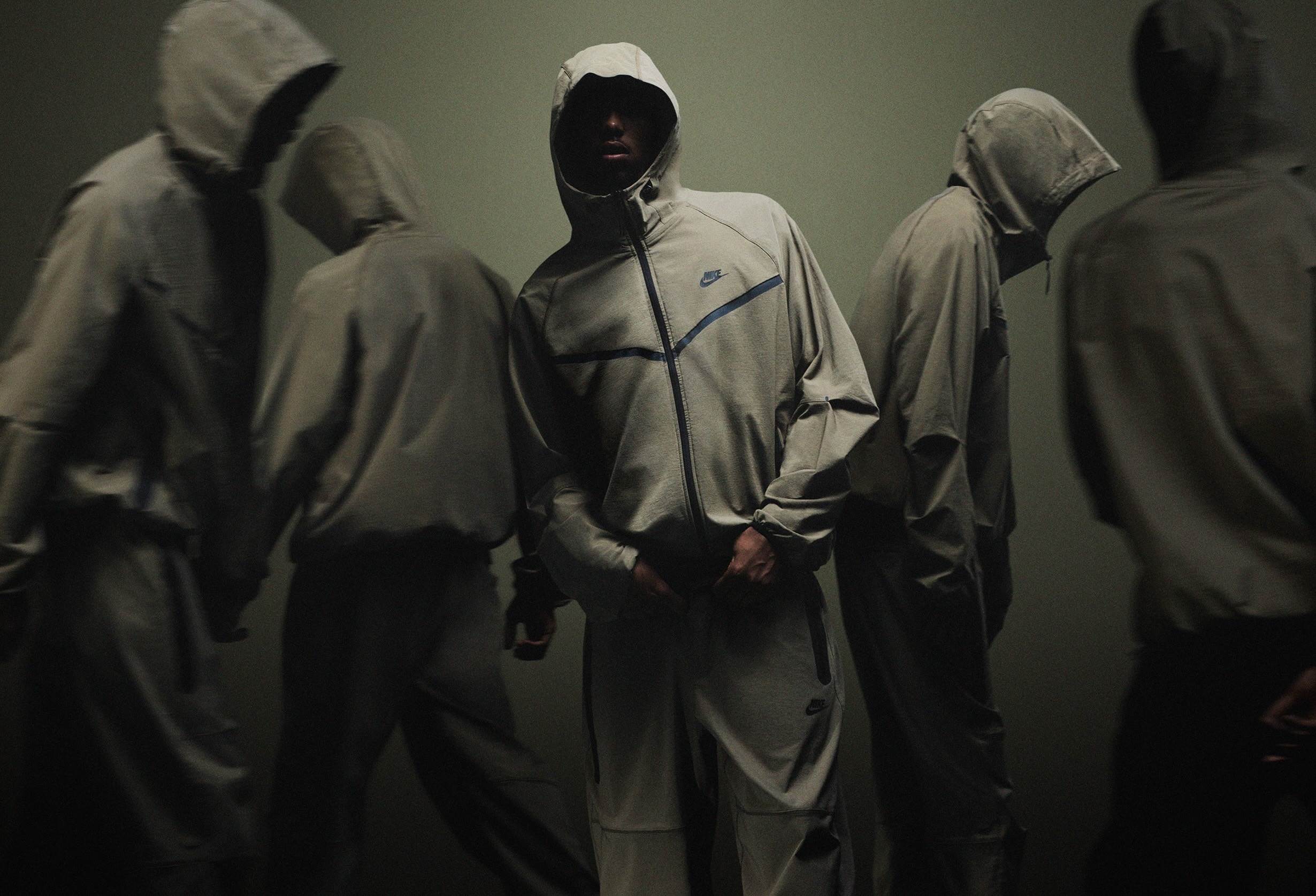 Nike plays up weaving in track suits