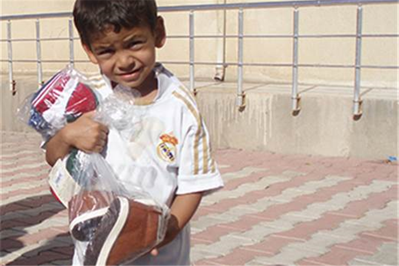 Charity diverts overstocked footwear to refugee camps