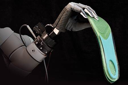 Robotic bagging of insoles                                                                                                                                                                              