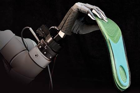Robotic bagging of insoles - leather, world leather