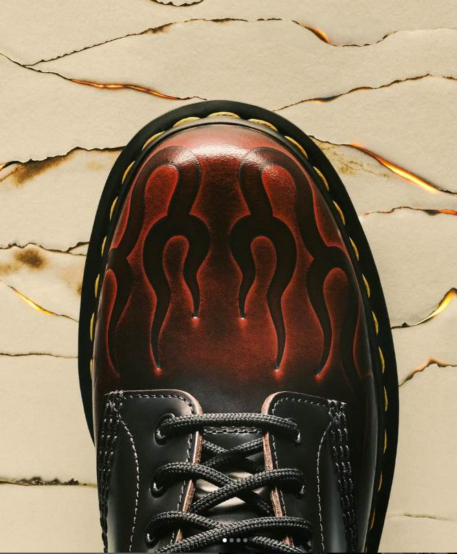 Dr Martens reports steady trading